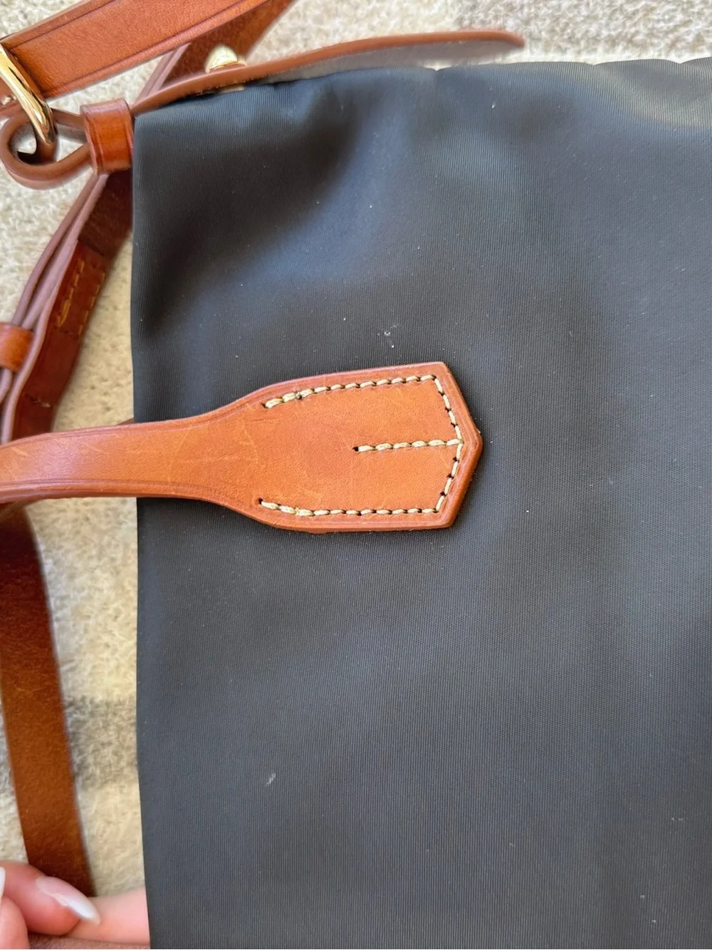 Nylon navy Dooney tote with crossover strap